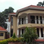 a-bangalow-in-kampala-finished-with-texture-coating-moran-marble-stone
